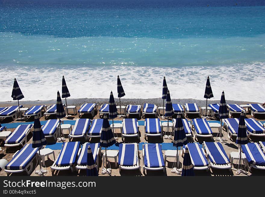 Loungers on the beach, Nice, France