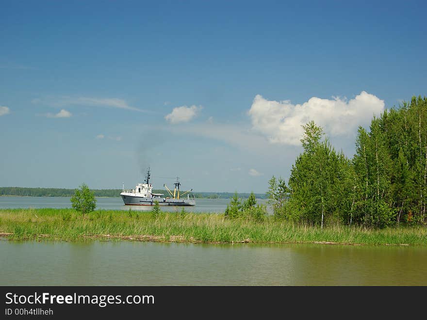 Landscape with ship on the lake and island