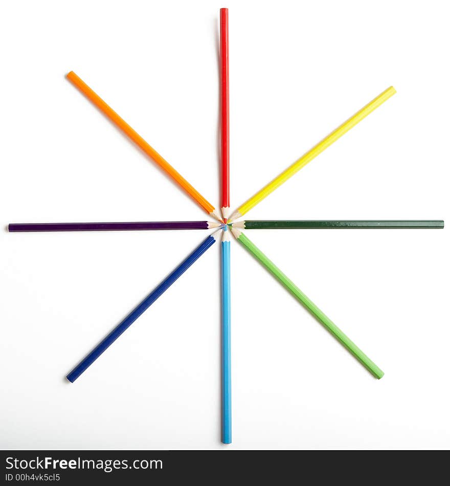 A Circle of Colored Pencils on White Background. A Circle of Colored Pencils on White Background