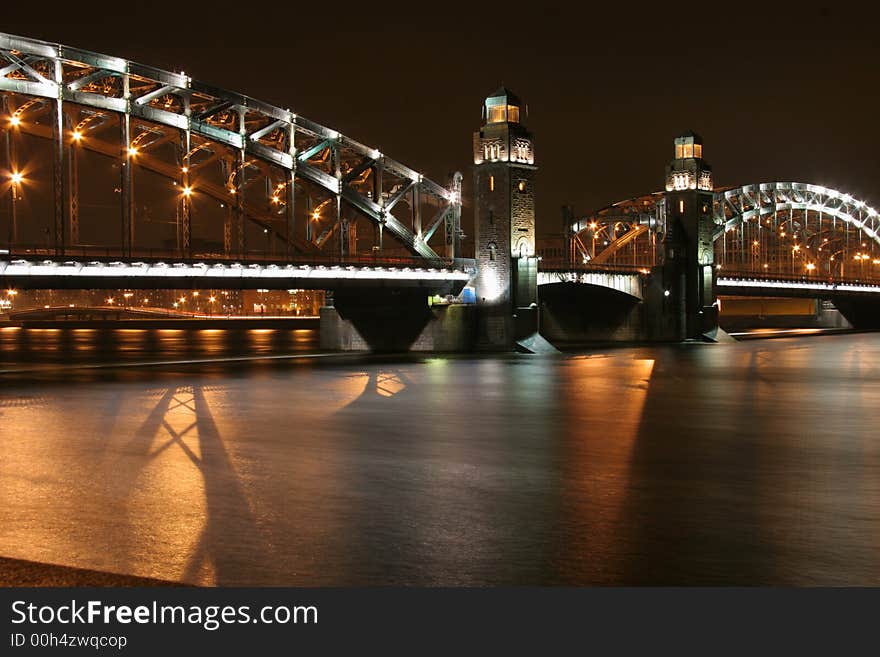 Nice night image of Bolsheohtinsky Bridge - one of most beatiful bridges of Saint-Petersburg, Russia. Nice night image of Bolsheohtinsky Bridge - one of most beatiful bridges of Saint-Petersburg, Russia