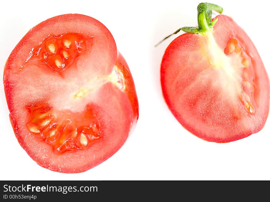 Pieces of tomato on white background,isolated. Pieces of tomato on white background,isolated