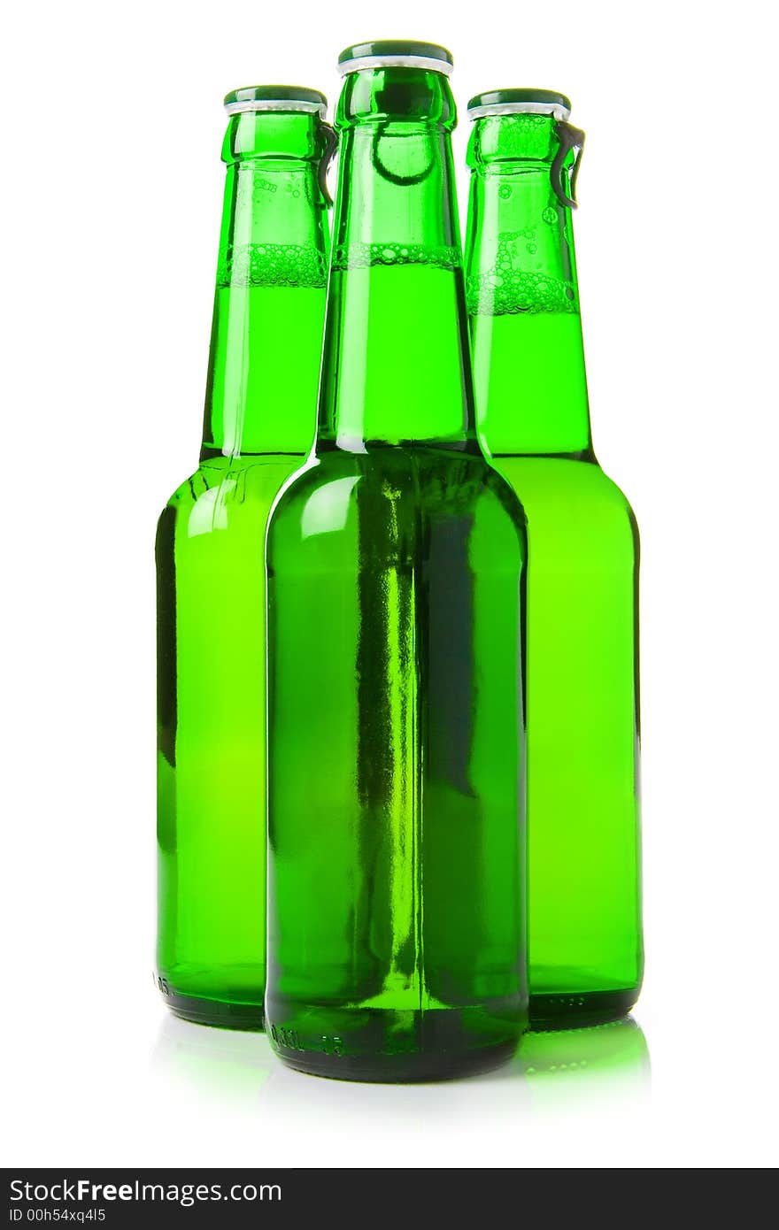 Bottles of beer against a white background. Bottles of beer against a white background