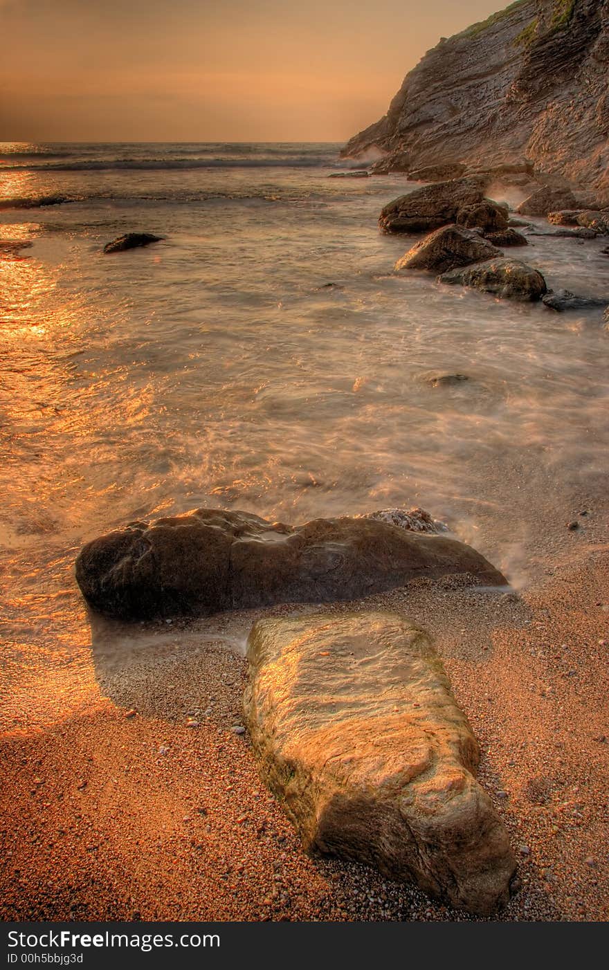 Sunset by the ocean