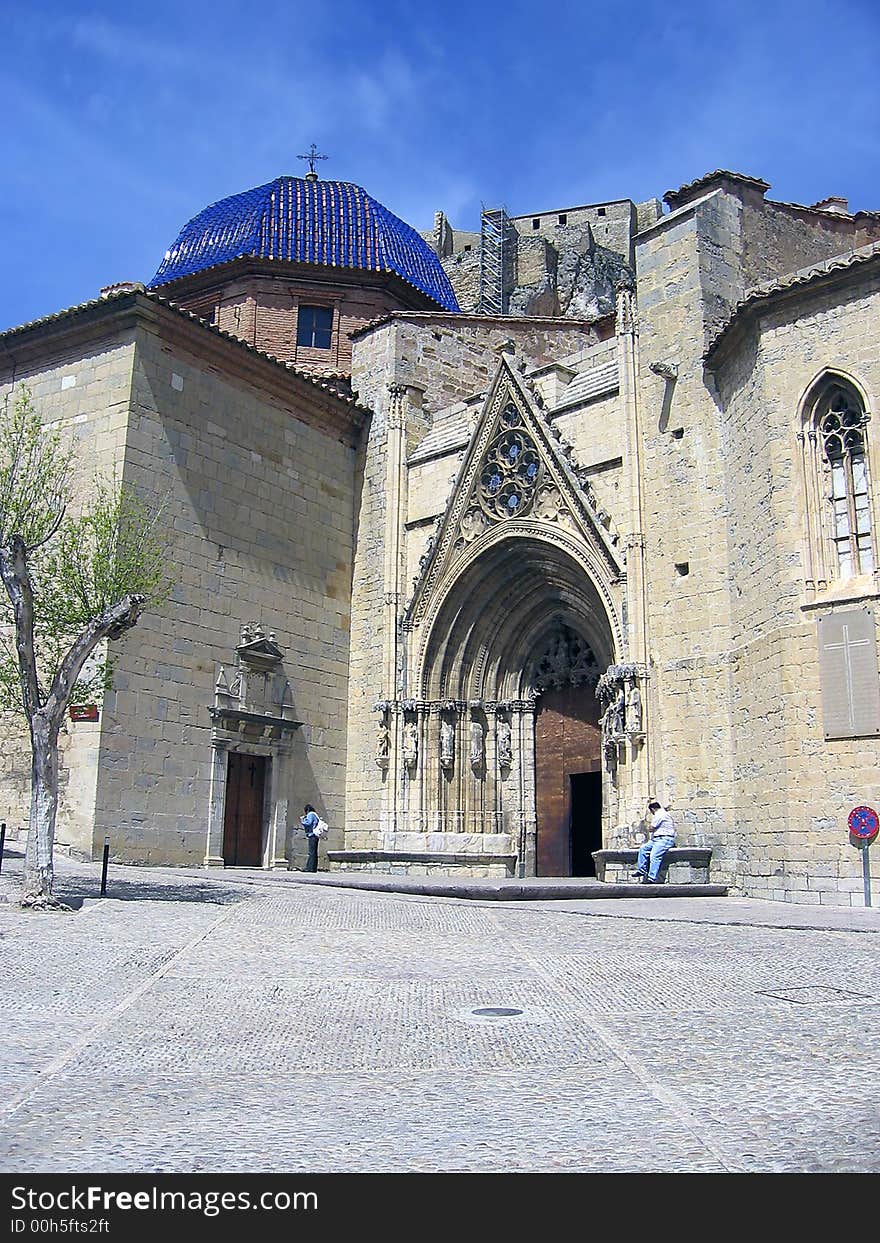 Small town colorful church Morella blue sky