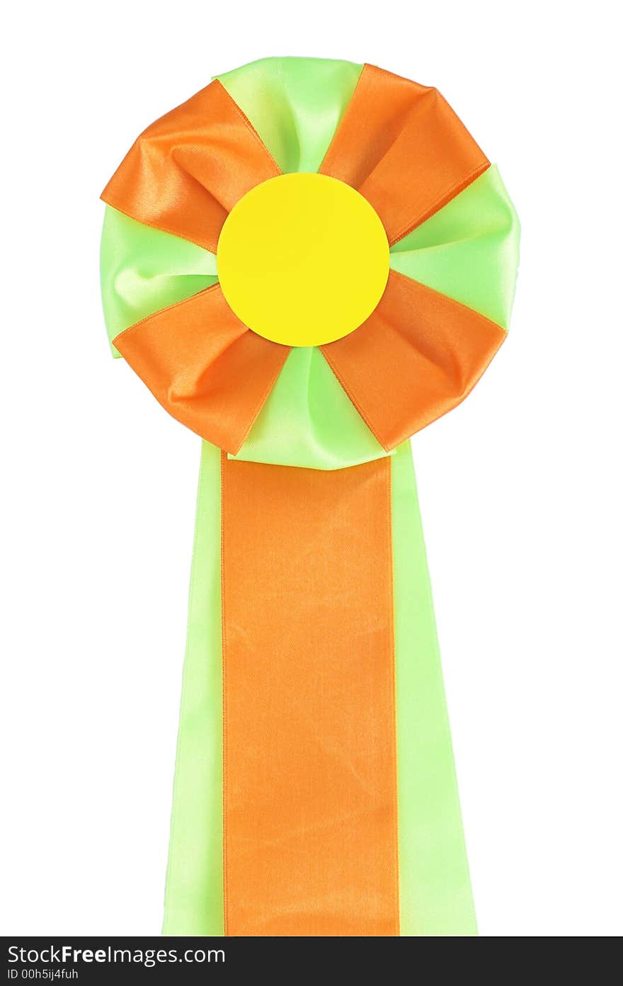 Close-up green orange award rosette. Image contains clipping path. Close-up green orange award rosette. Image contains clipping path.