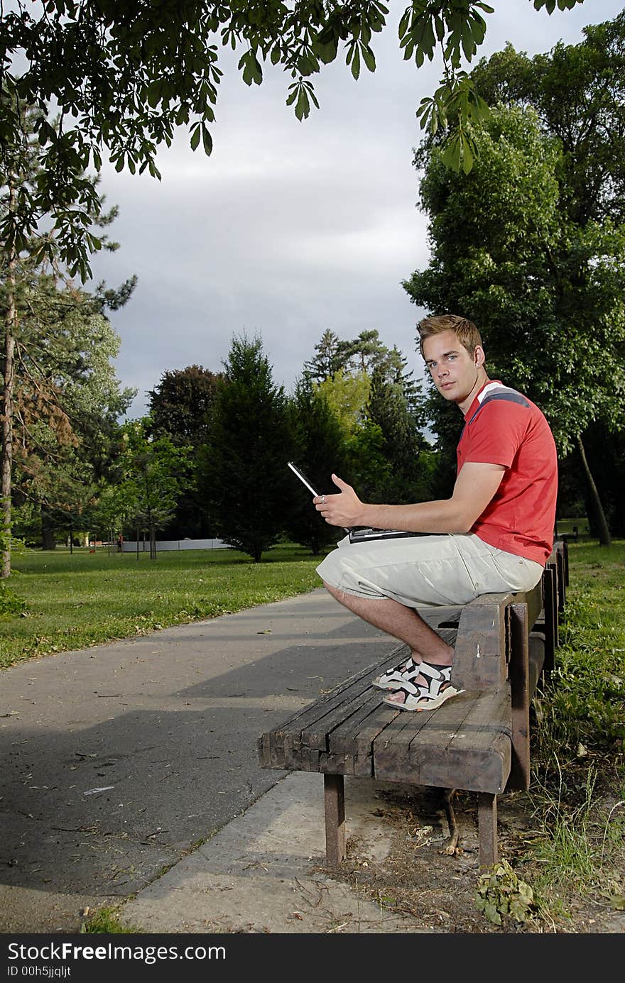 Young Man With Notebook