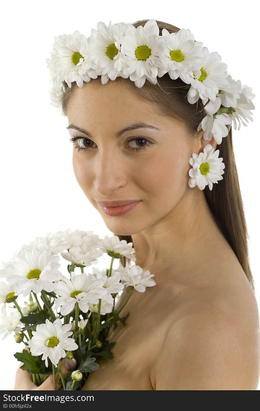 Young, beautiful and naked woman with bouquet of white flowers. White background, looking at camera. Side view. Young, beautiful and naked woman with bouquet of white flowers. White background, looking at camera. Side view