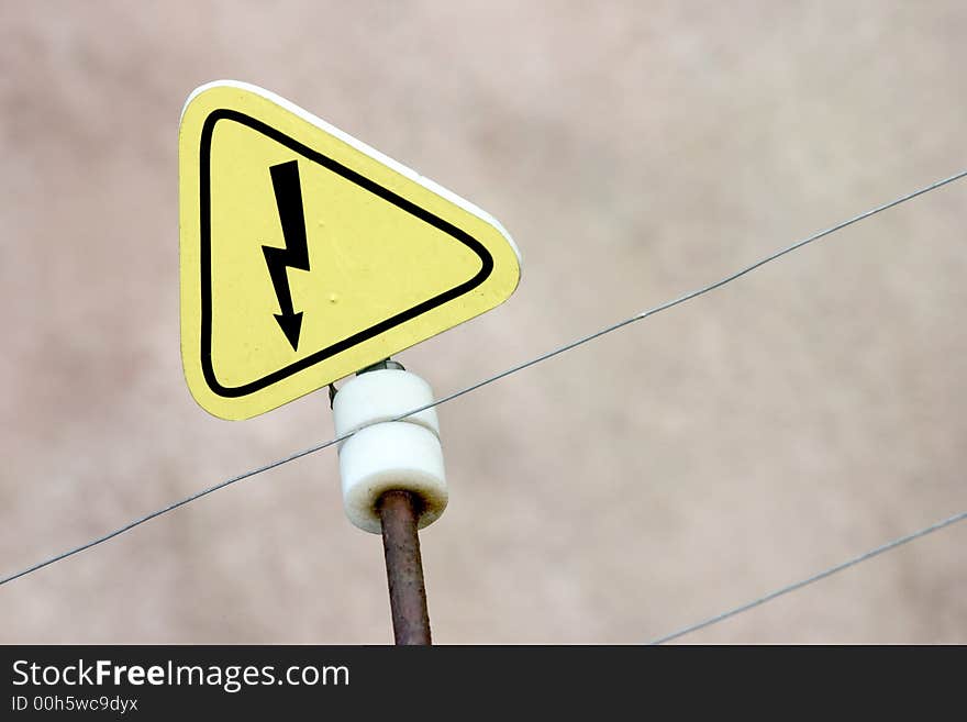 Sign of electric preassure