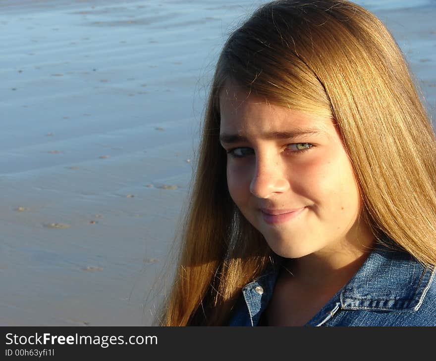 Young girl on the beach, Head & Shoulders shot. Young girl on the beach, Head & Shoulders shot