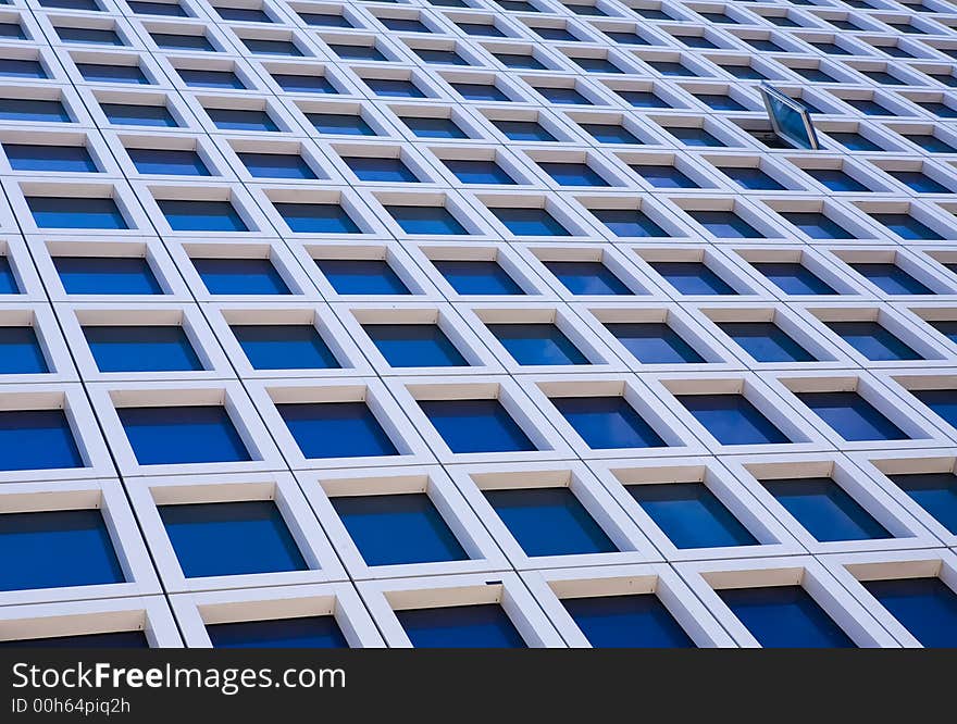 Windows of modern skyscrapers office building. Windows of modern skyscrapers office building