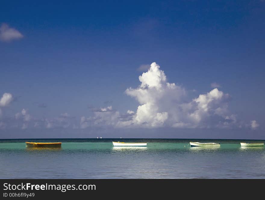 Line of boats at anchor