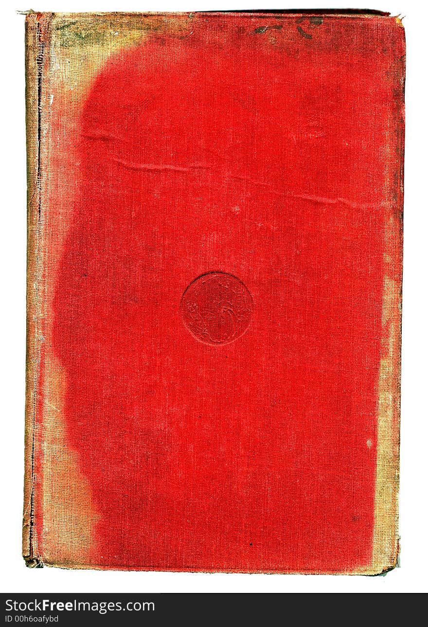 Worn and damaged red book with embossed medallion in the center of the cover.  Small volume about color theory dating from early 1900's.  Object shows much use, wear and distress.  Possibly exposed to floodwaters at some point.  Isolated on a white ground. Worn and damaged red book with embossed medallion in the center of the cover.  Small volume about color theory dating from early 1900's.  Object shows much use, wear and distress.  Possibly exposed to floodwaters at some point.  Isolated on a white ground