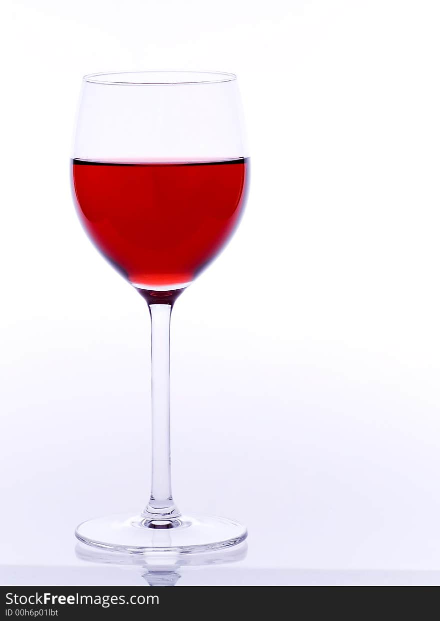 Glass of red wine on  the white background