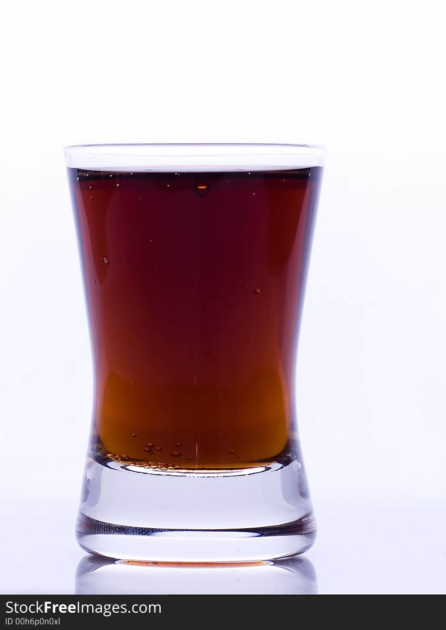 Glass of cola on  the white background