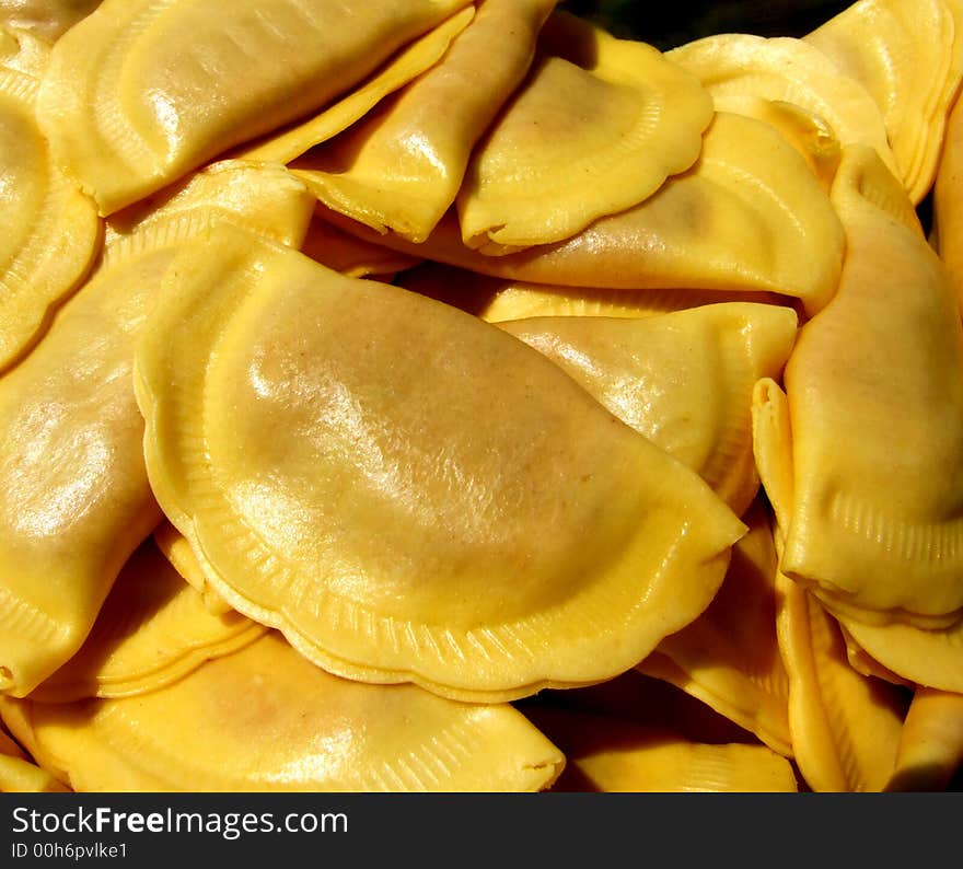 An image of a background full of pasta.