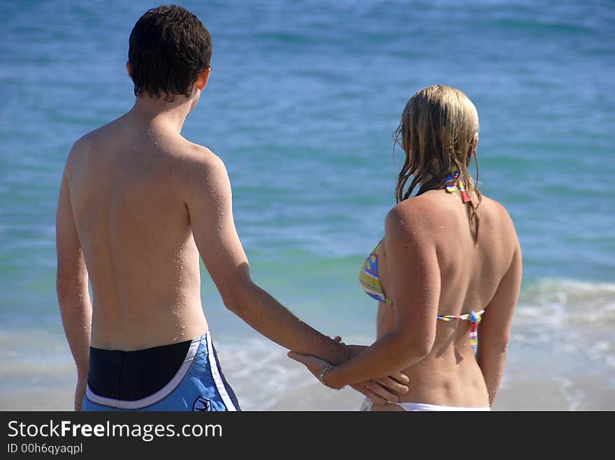 A young couple on the beach. A young couple on the beach