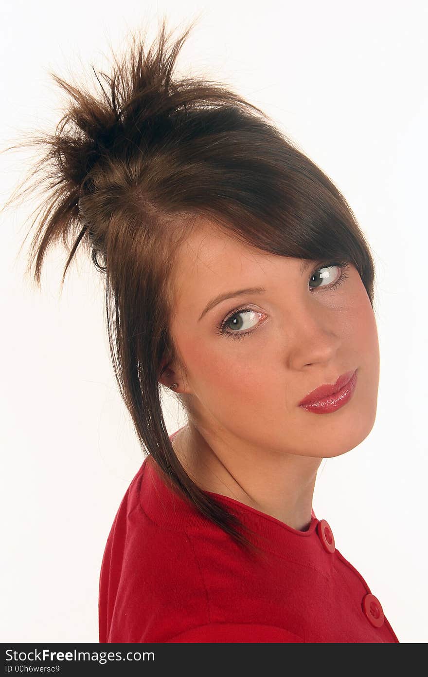 Young attractive female dressed in red. White background. Young attractive female dressed in red. White background.