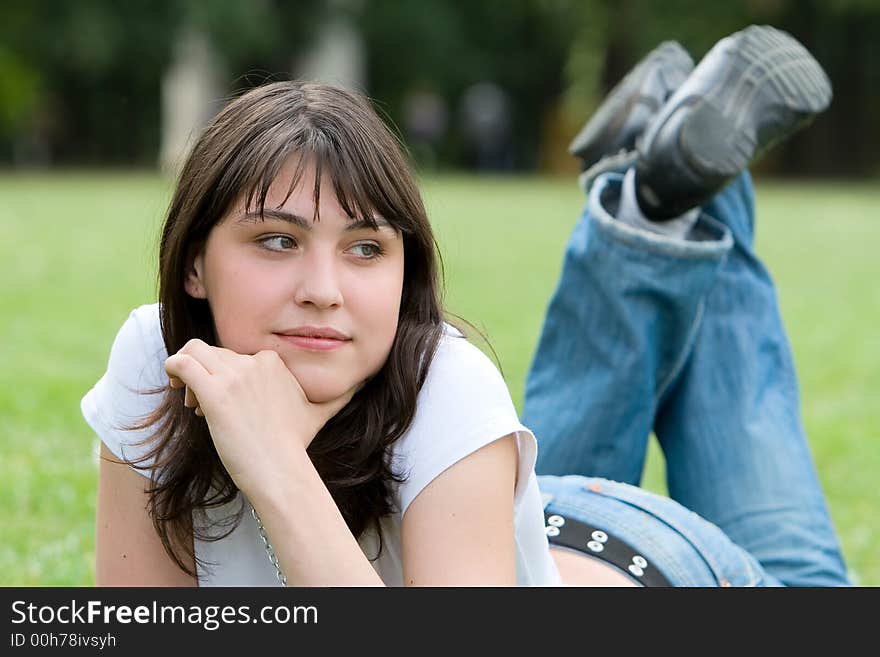 Girl lying on meadow