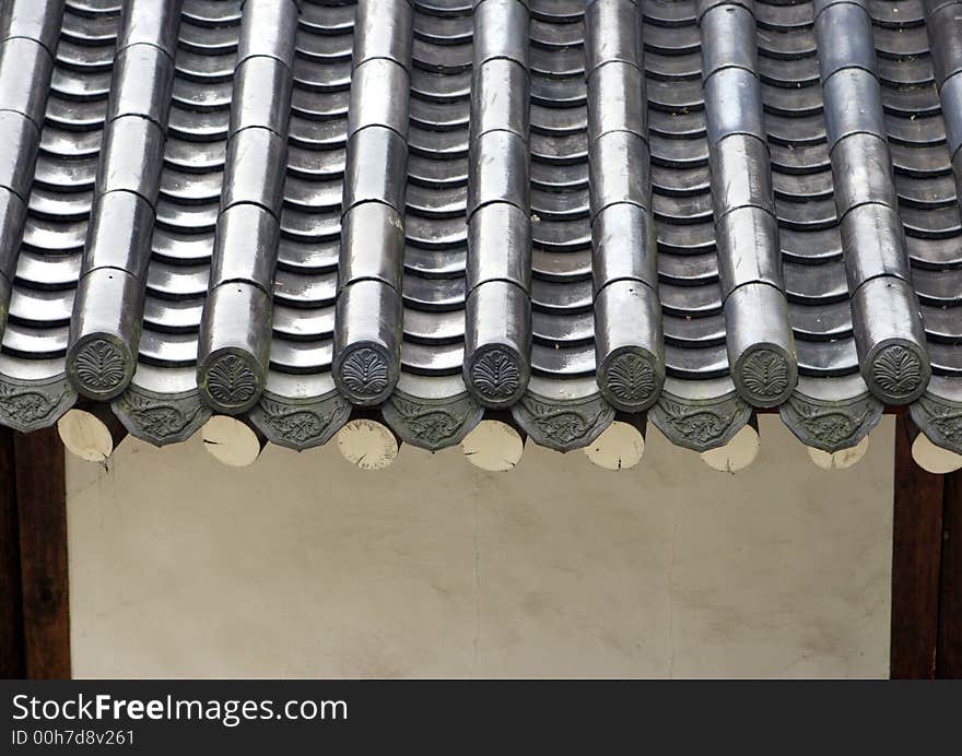 Close-up of the roof of a Korean temple - travel and tourism. Close-up of the roof of a Korean temple - travel and tourism.