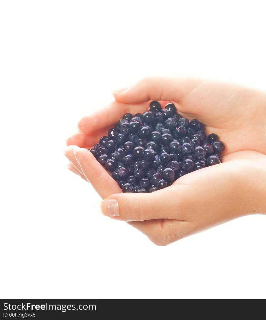 Handful of blueberries isolated on white background