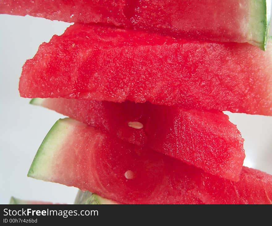 Juicy watermelon pieces stack for summer picnic. Juicy watermelon pieces stack for summer picnic