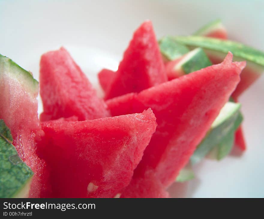 Juicy watermelon pieces stack for summer picnic. Juicy watermelon pieces stack for summer picnic