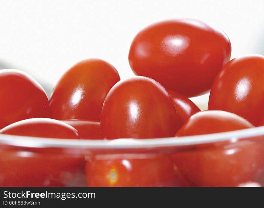 Close-up of cherry tomatoes in a glass bowl