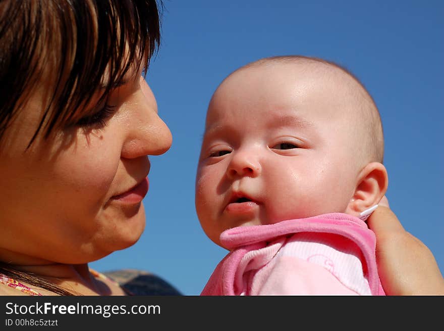 Mother holding newborn baby