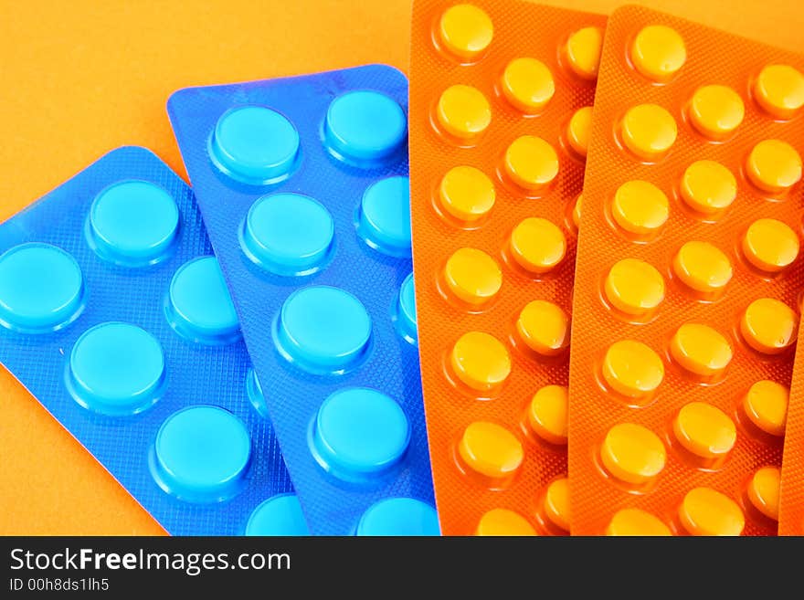 Blue and orange tablets