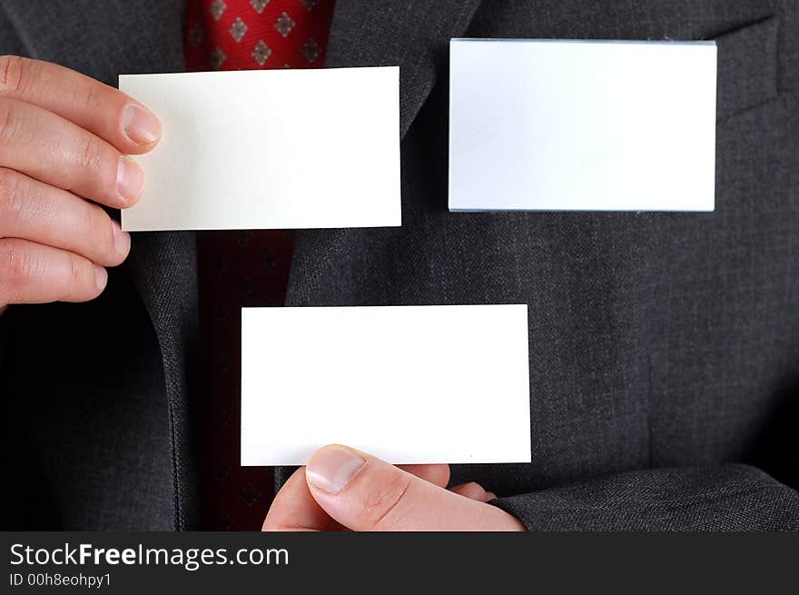 Businessman holding blank visiting card. Businessman holding blank visiting card