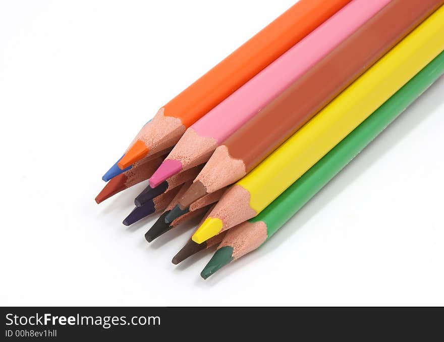 Colored pencils on a white background