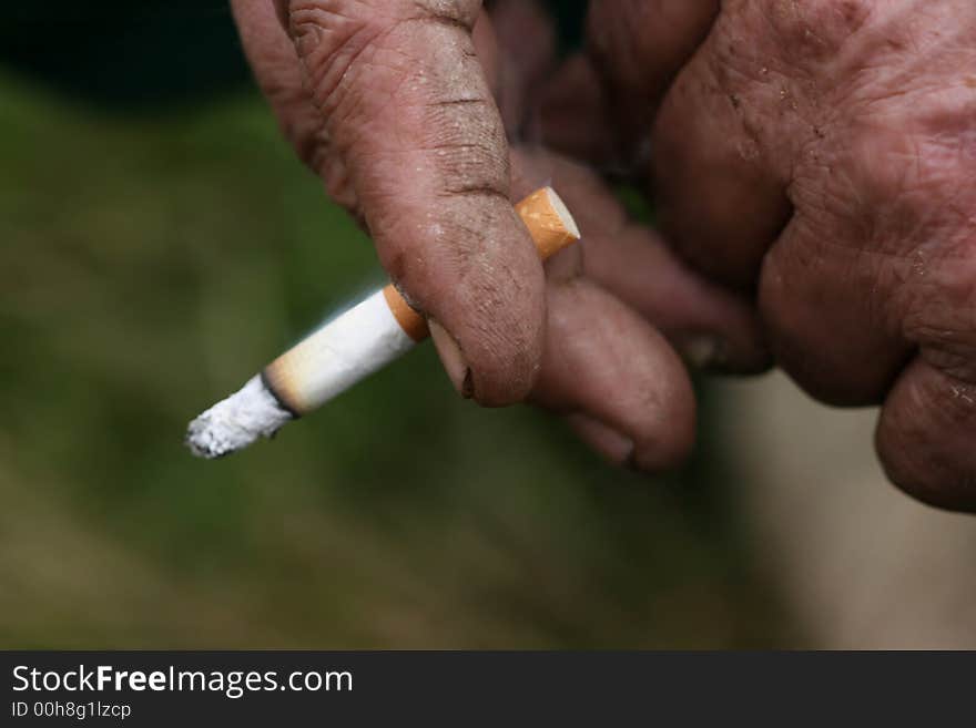 Cigarette In Hand