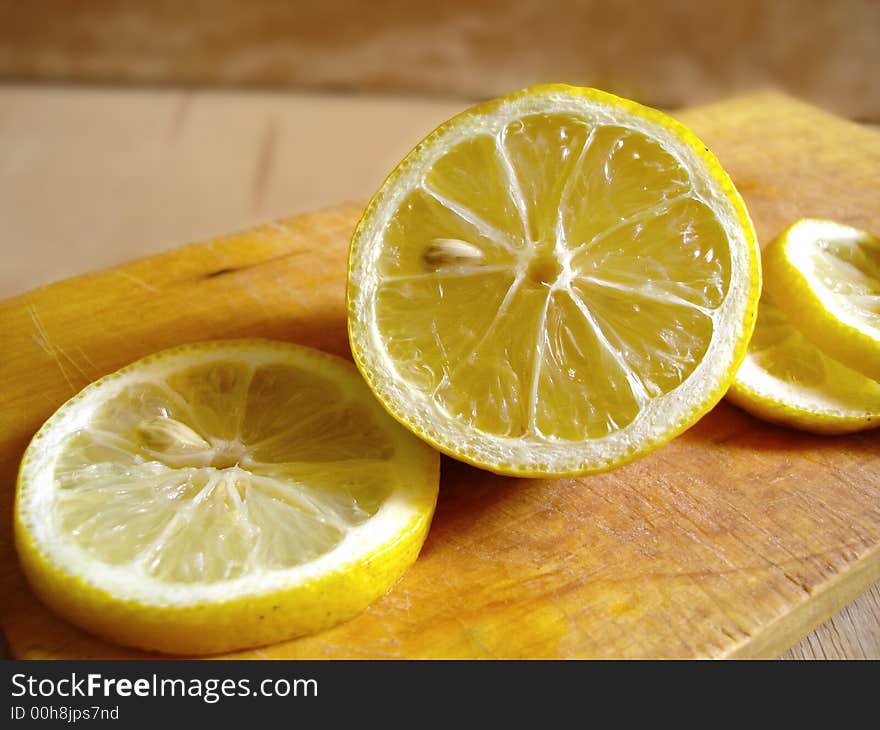 The Lemon On A Wooden Board