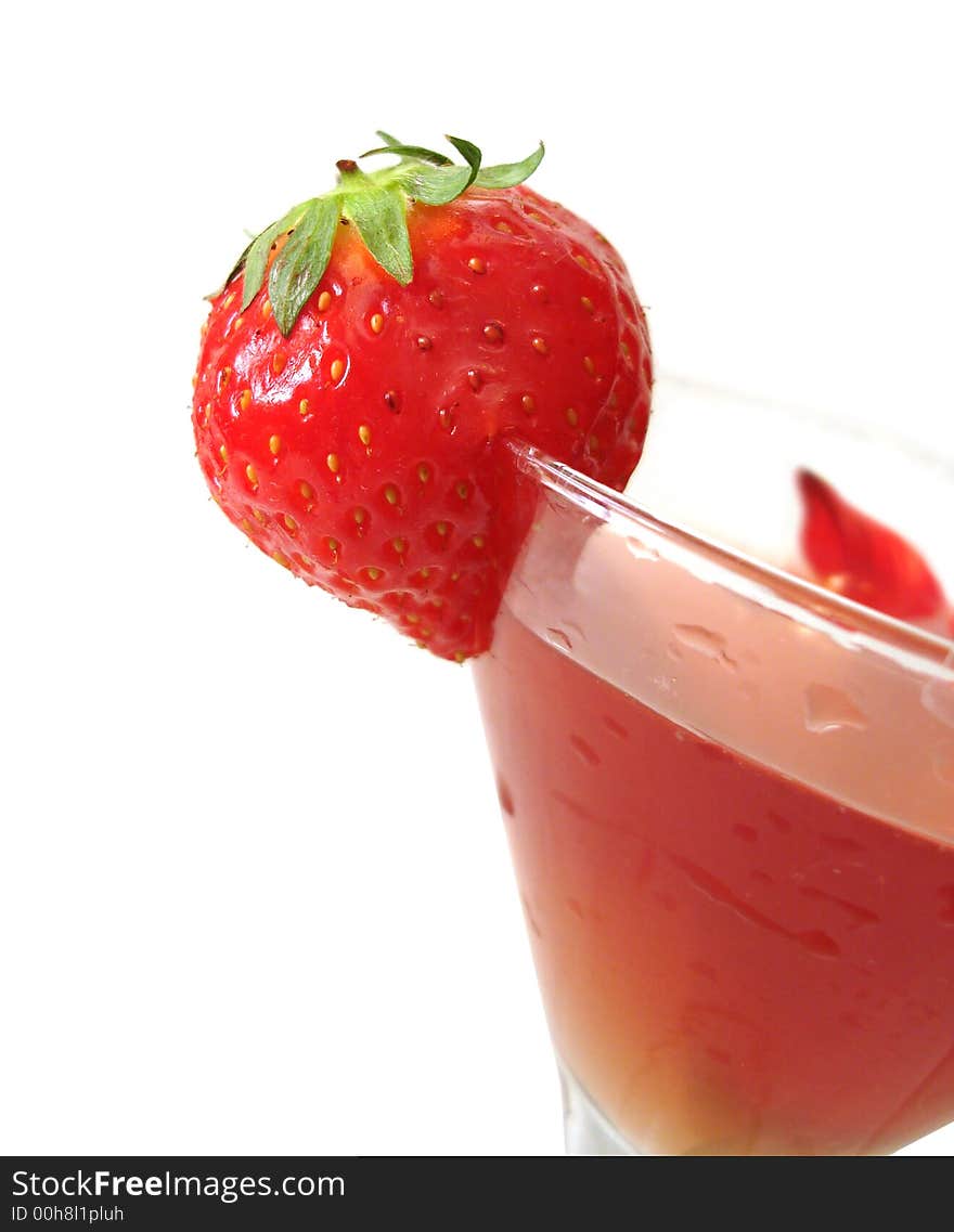 Strawberry with glass of juice isolated