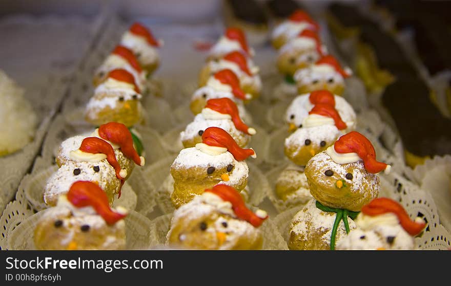 Rows and Columns of Christmas Snowman Creampuffs on Display (3219). Rows and Columns of Christmas Snowman Creampuffs on Display (3219)