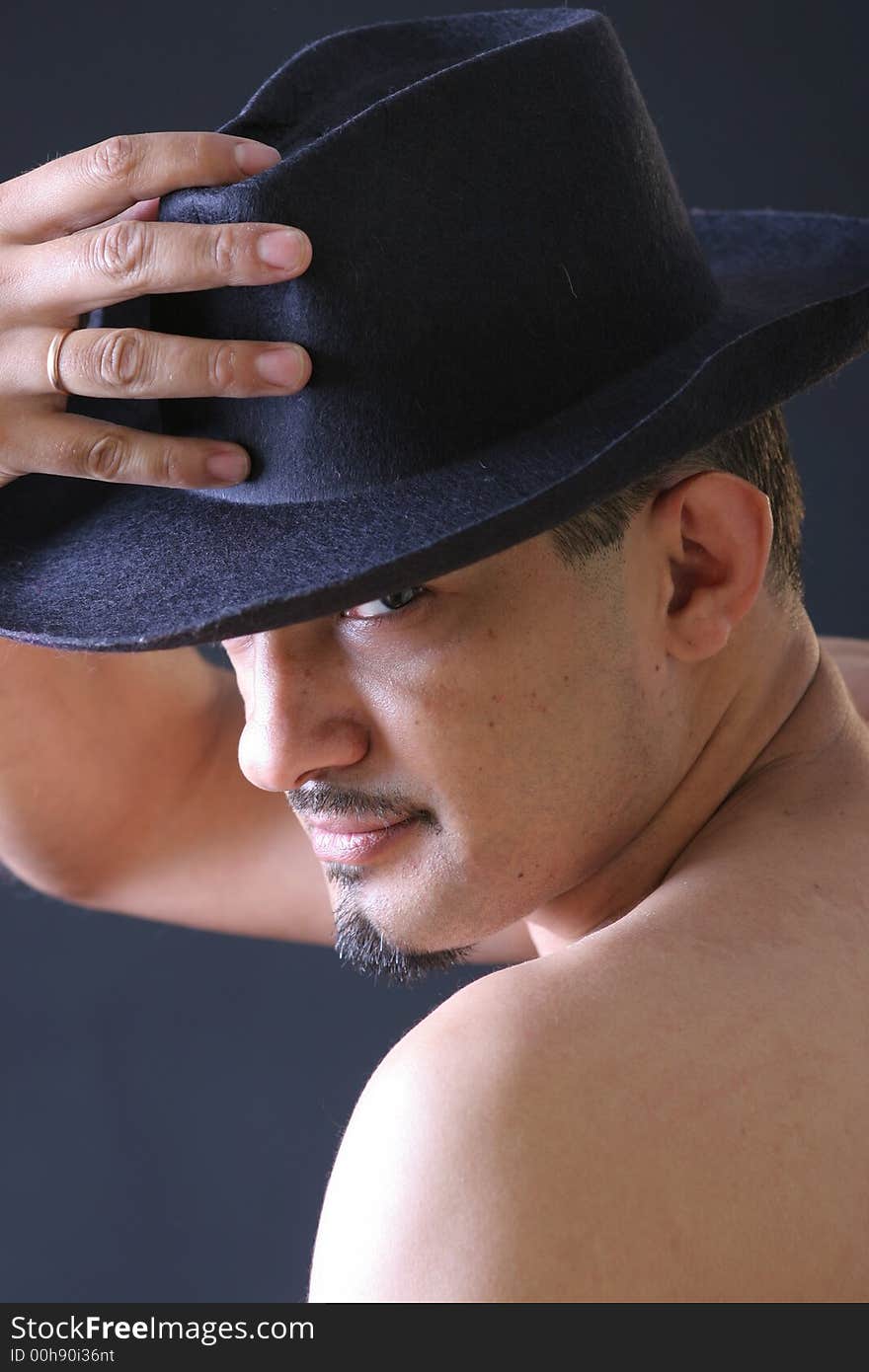 Portrait of a young man with hat. Portrait of a young man with hat