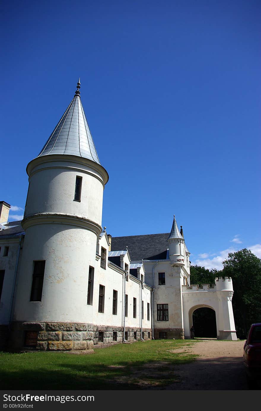 Beautiful white castle in the background of blue sky. Beautiful white castle in the background of blue sky