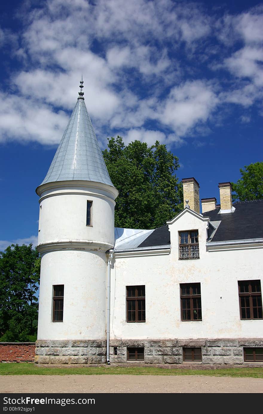 Beautiful white castle in the background of blue sky. Beautiful white castle in the background of blue sky