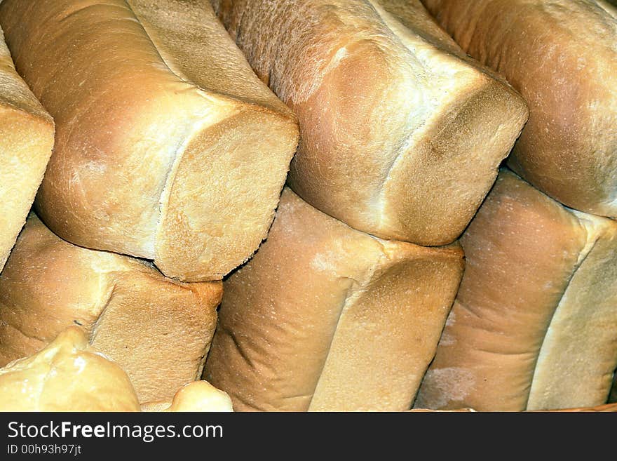 Loaves of fresh baked bread at an indoor market in Vancouver, BC. Loaves of fresh baked bread at an indoor market in Vancouver, BC