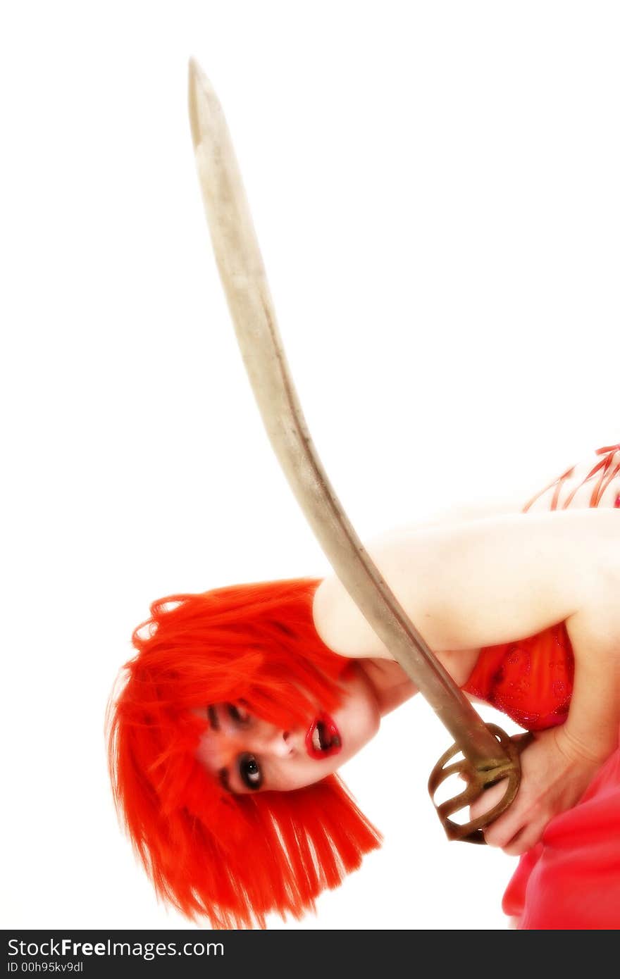 High key goth. Beautiful woman with red hair, red dress with sword. Over white. High key goth. Beautiful woman with red hair, red dress with sword. Over white.