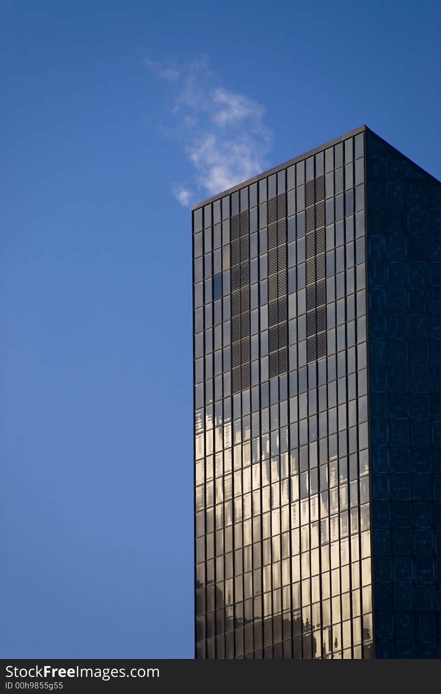 Office tower venting steam in downtown Seattle, WA. Office tower venting steam in downtown Seattle, WA