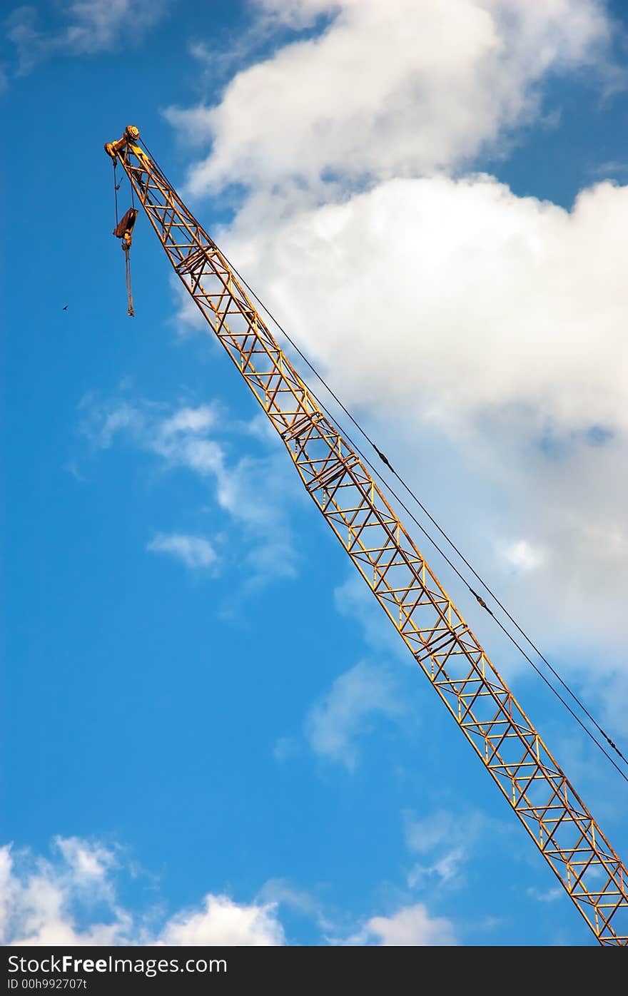 Crane on the sky background