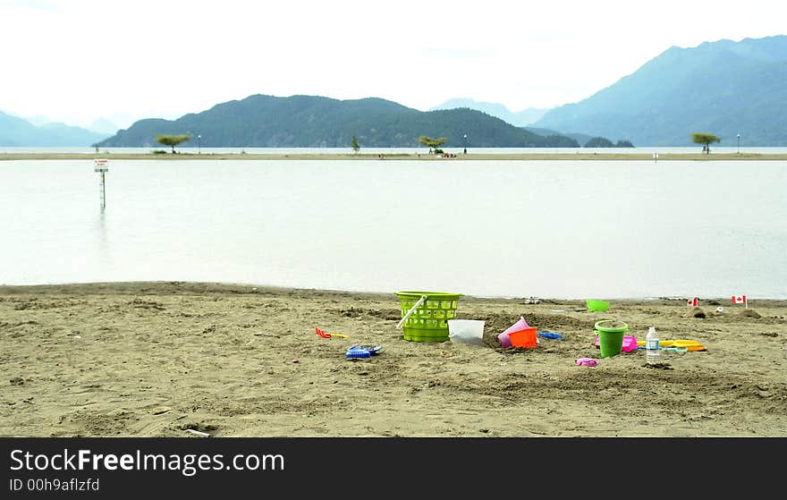 Sand toys on the beach at Harrison Hot Springs, BC. Sand toys on the beach at Harrison Hot Springs, BC