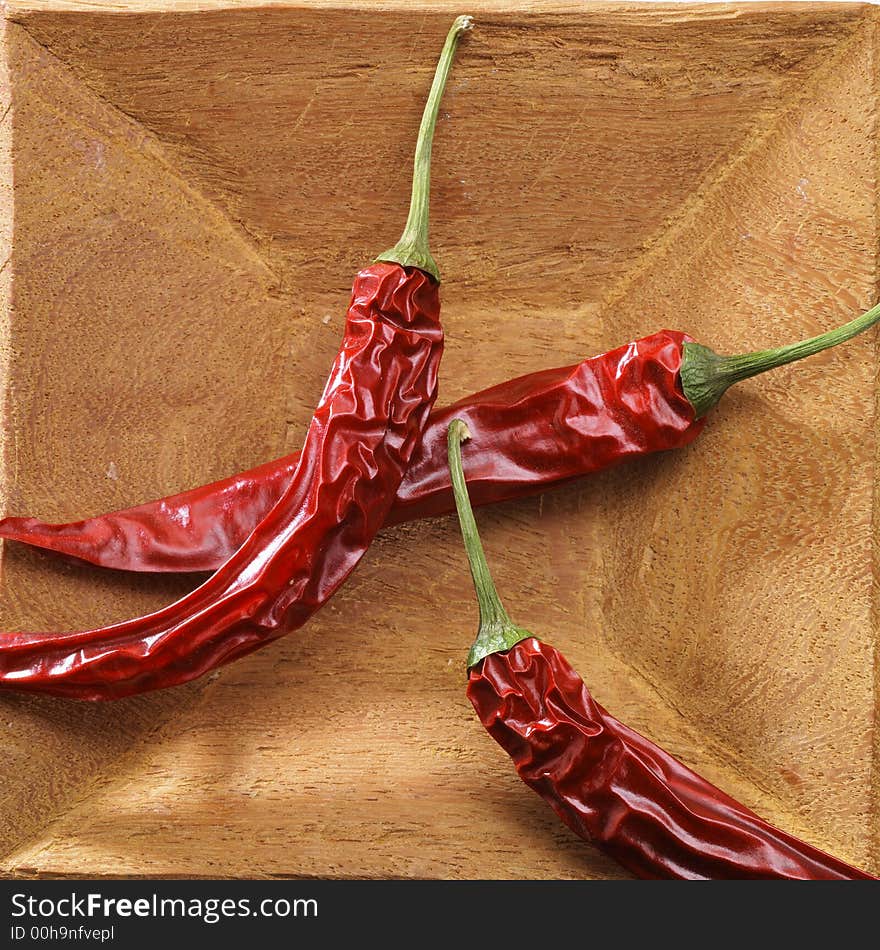 Red pepper on wood