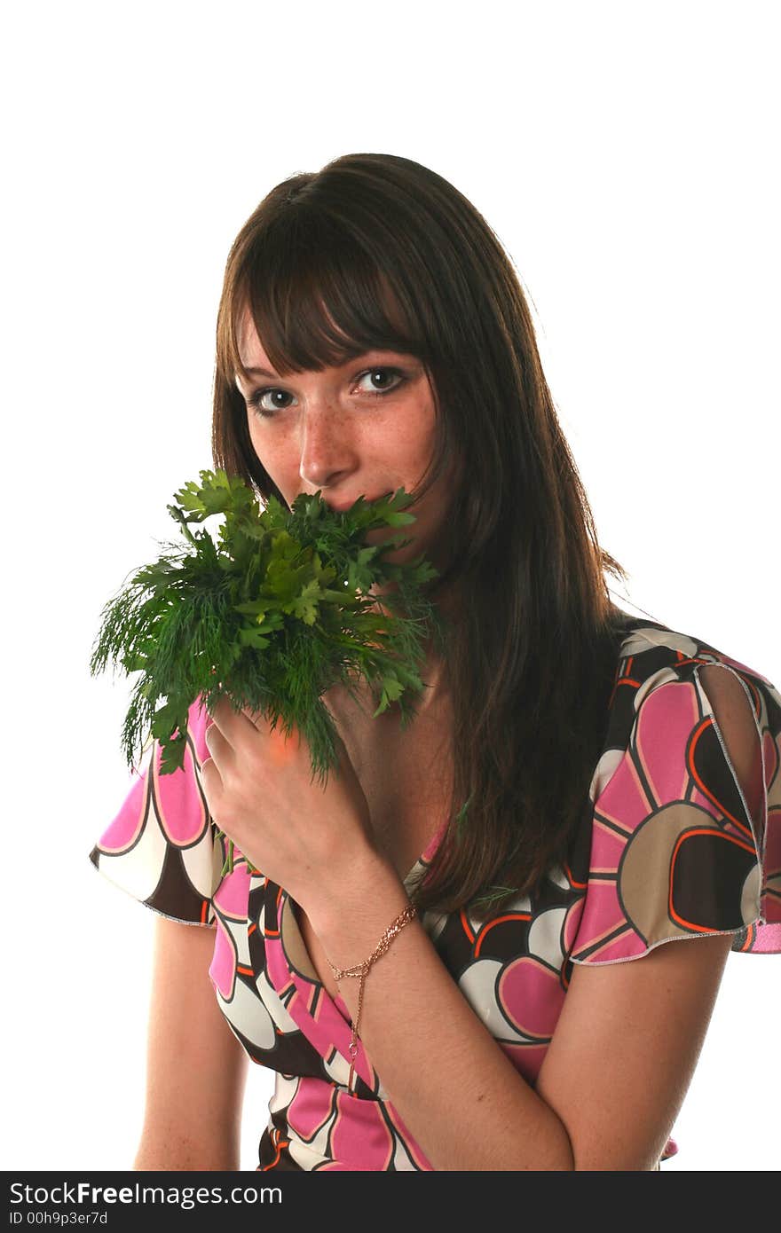 Girl with a parsley and fennel on a white background