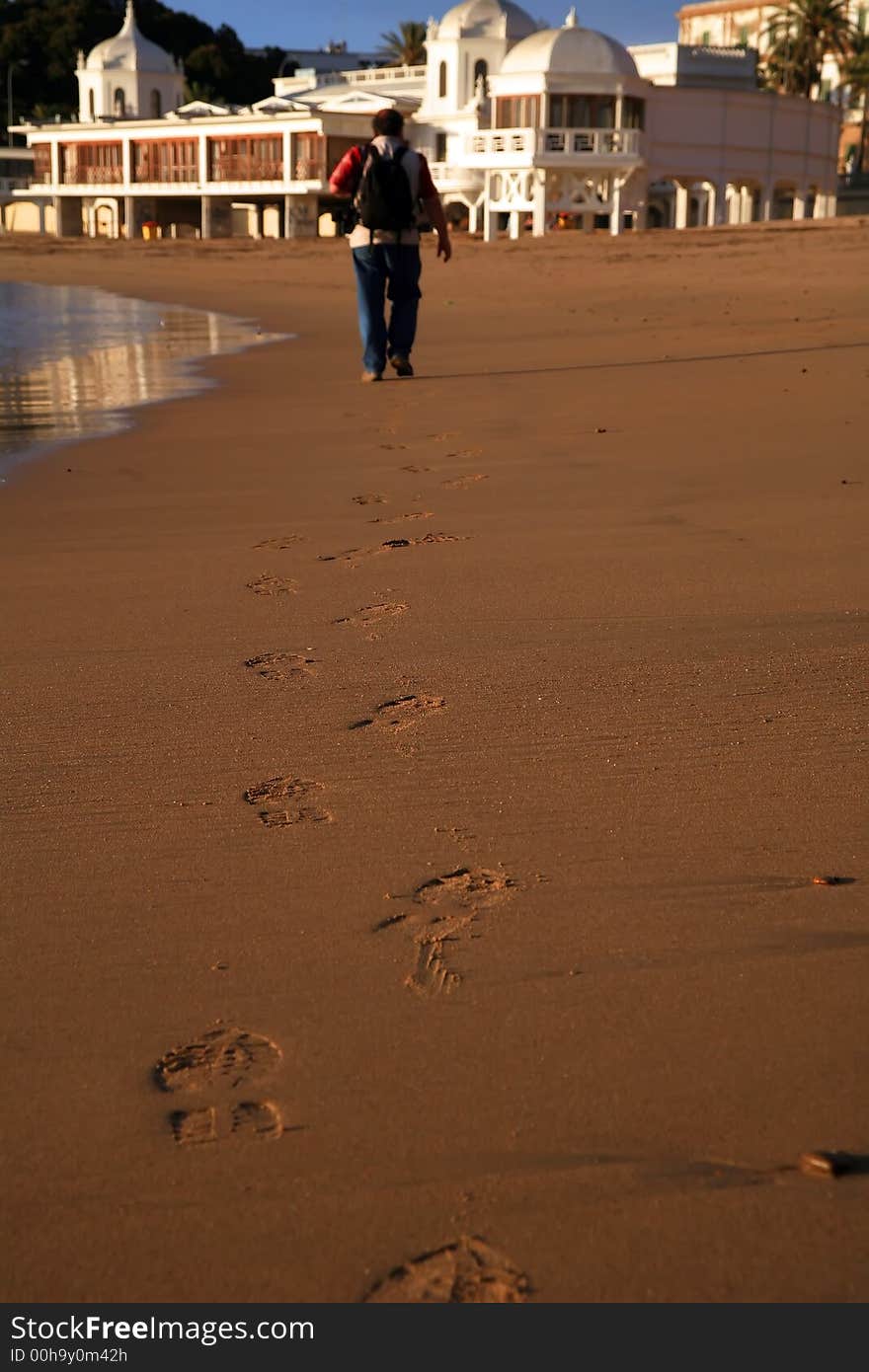 Footprints in the sand on the city beach. Footprints in the sand on the city beach