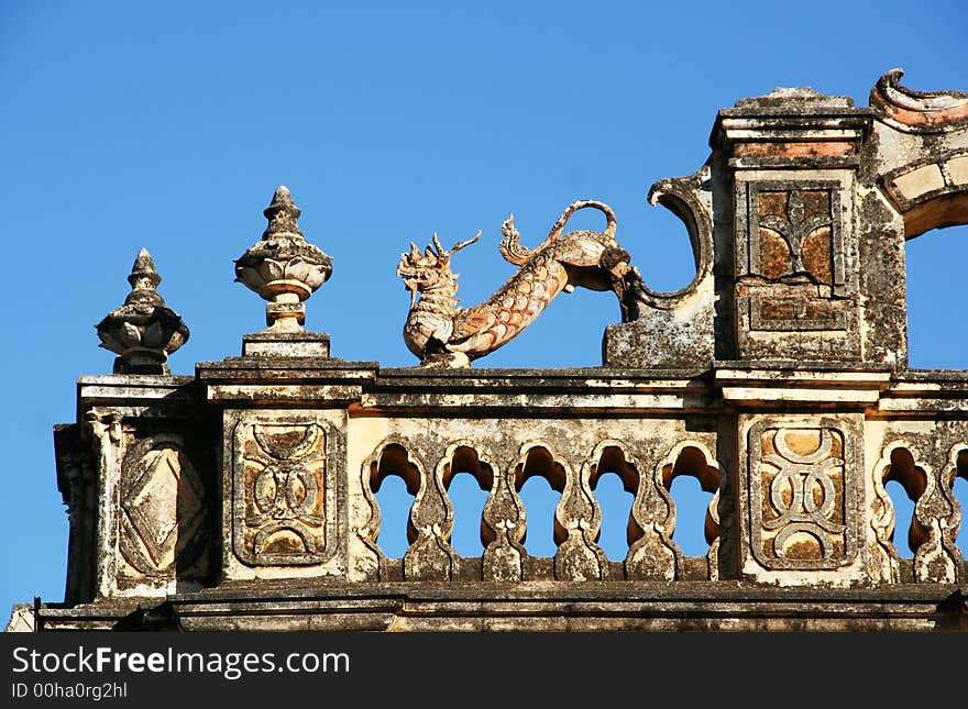 Dragon on the roof of old temple in Bagan (Myanmar)