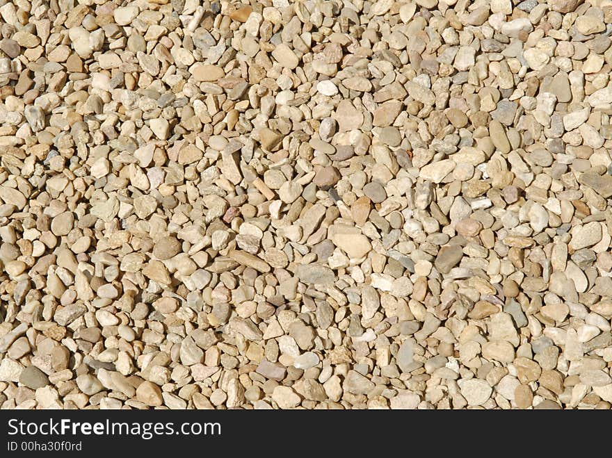 Road metal pebbles organic background.