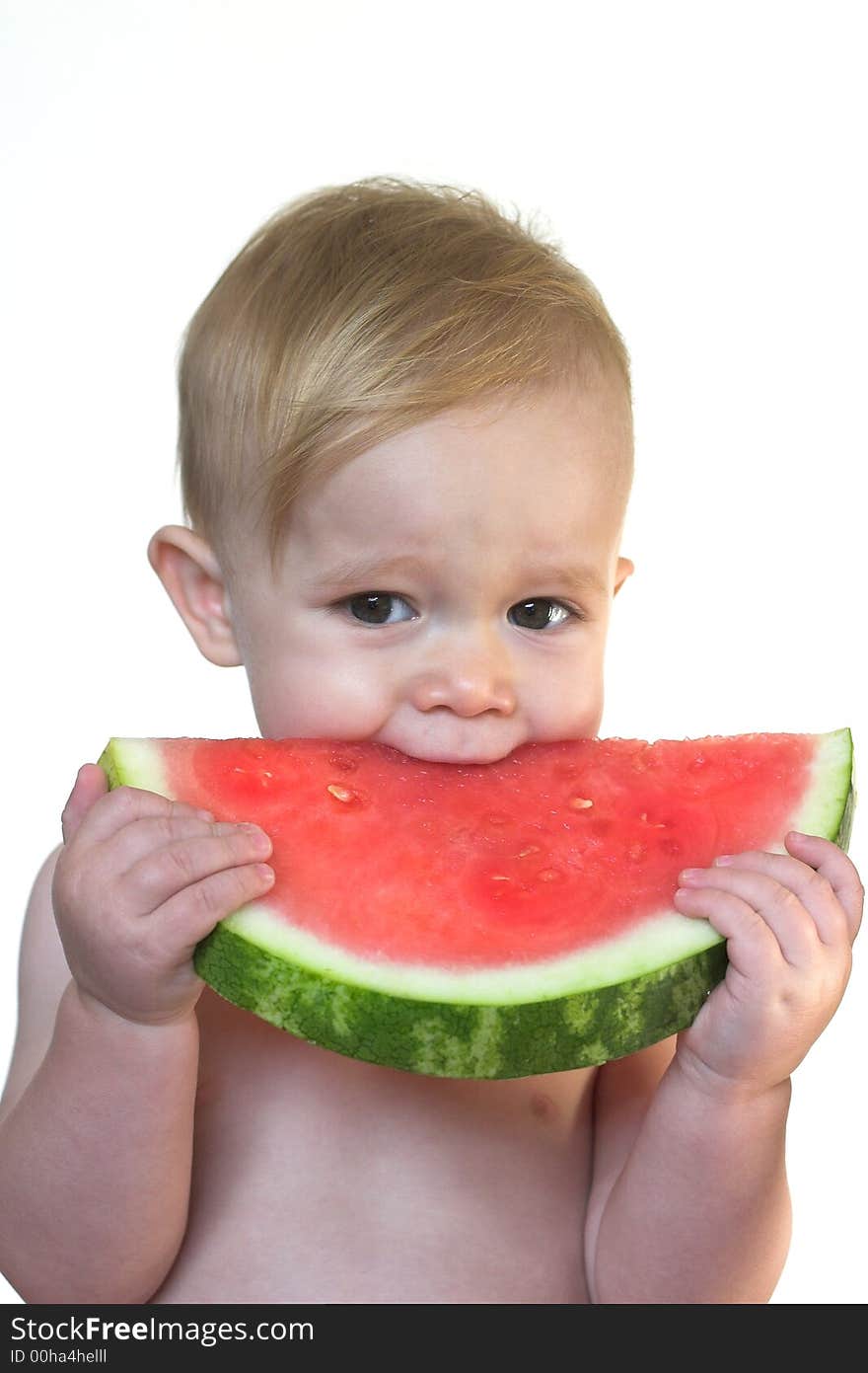 Image of cute toddler eating a big piece of watermelon. Image of cute toddler eating a big piece of watermelon