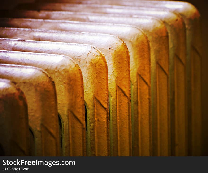 Close up of radiator in warming tones and highlights. Close up of radiator in warming tones and highlights